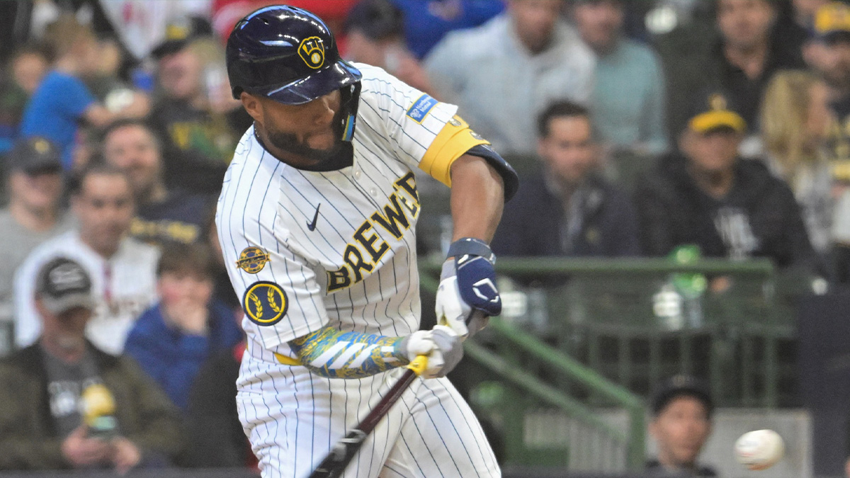 Milwaukee Brewers left fielder Jackson Chourio (11) hits a solo home run in the seventh inning against the Cincinnati Reds at American Family Field.