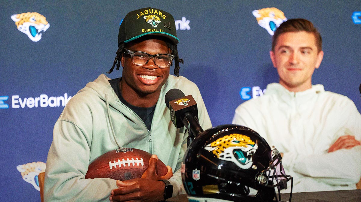 The Jacksonville Jaguars’ first-round pick, Colorado Buffaloes wide receiver and defensive back Travis Hunter, left, answers questions during a press conference Friday, March 25, 2025 at Miller Electric Center in Jacksonville, Fla. with General Manager James Gladstone, right.