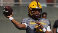 ASU quarterback Jaden Rashada (5) throws a pass during a spring practice at the Kajikawa practice fields in Tempe on April 16, 2024.