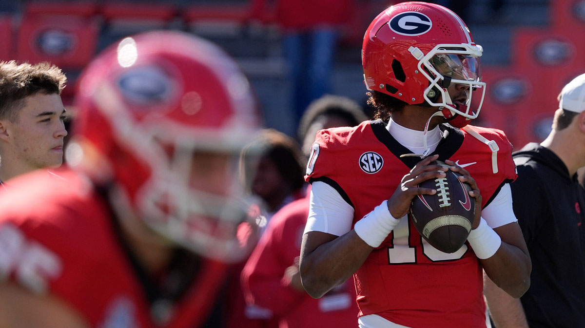 Georgia quarterback Jaden Rashada (10) warms up before the start of a NCAA college football game against Massachusetts in Athens, Ga., on Saturday, Nov. 23, 2024.