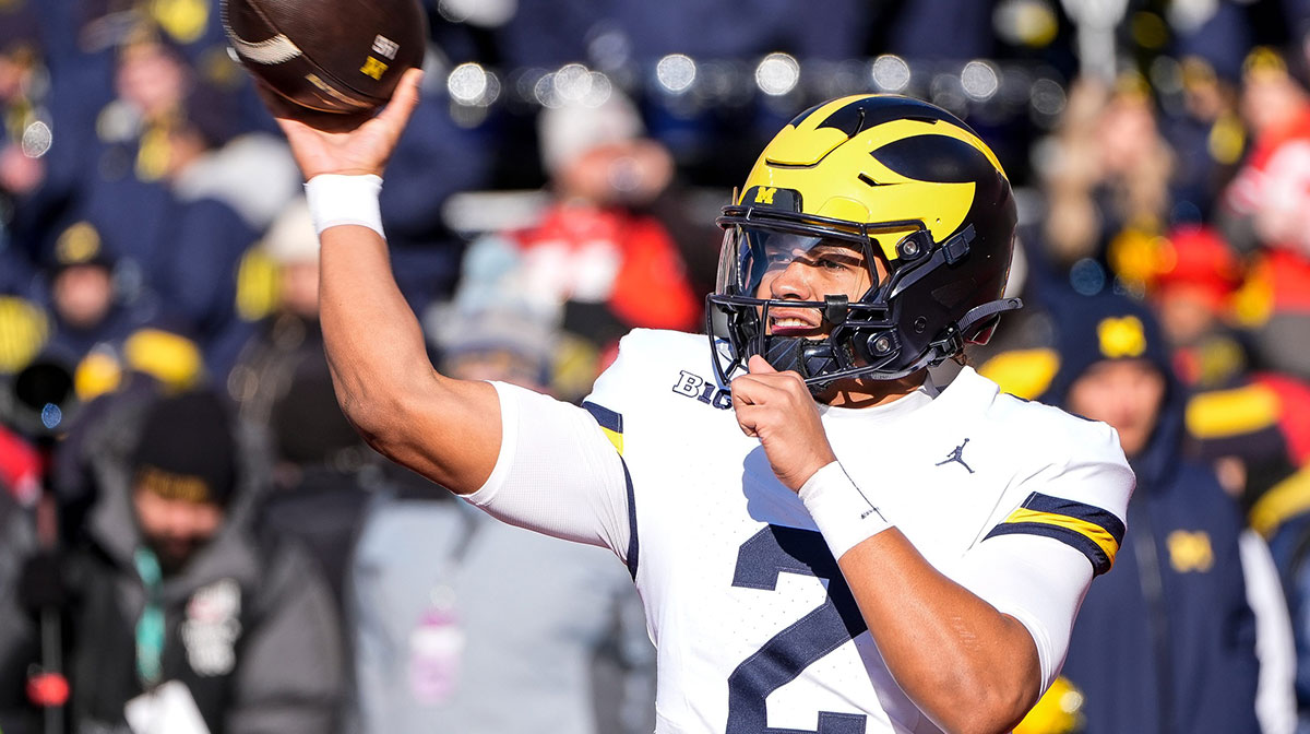 Michigan quarterback Jadyn Davis (2) warm up before the game between Ohio State and Michigan at Ohio Stadium in Columbus, Ohio on Saturday, Nov. 30, 2024.