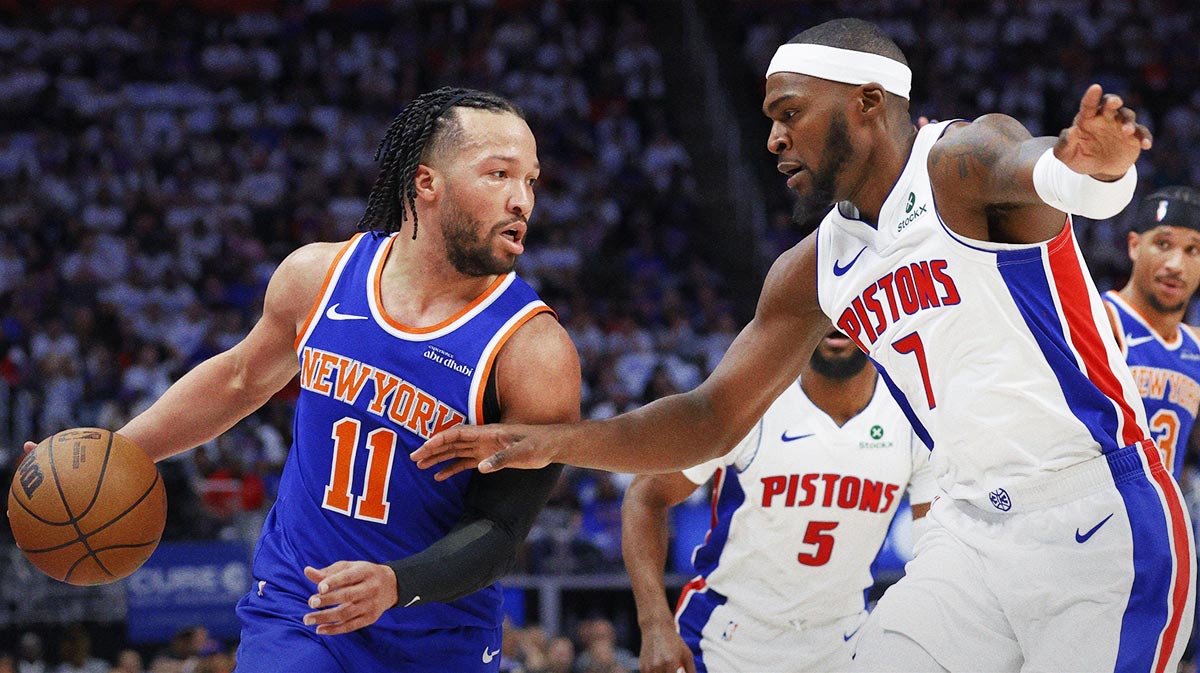 New York Knicks guard Jalen Brunson (11) dribbles defended by Detroit Pistons forward Paul Reed (7) in the first half during game three of first round for the 2024 NBA Playoffs at Little Caesars Arena.