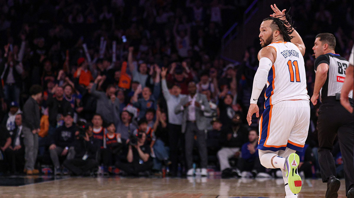 New York Knicks guard Jalen Brunson (11) reacts after a three point basket during the second half against the Phoenix Suns at Madison Square Garden.