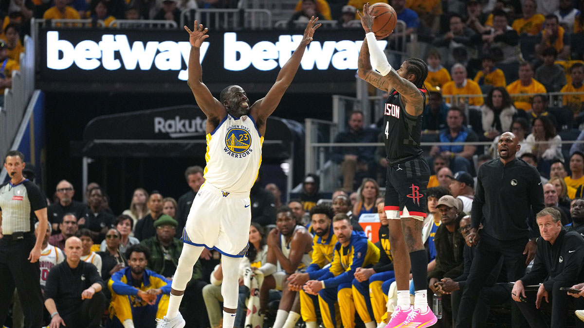 Houston Rockets guard Jalen Green (4) shoots against Golden State Warriors forward Draymond Green (23) during the first quarter of game three of first round for the 2024 NBA Playoffs at Chase Center