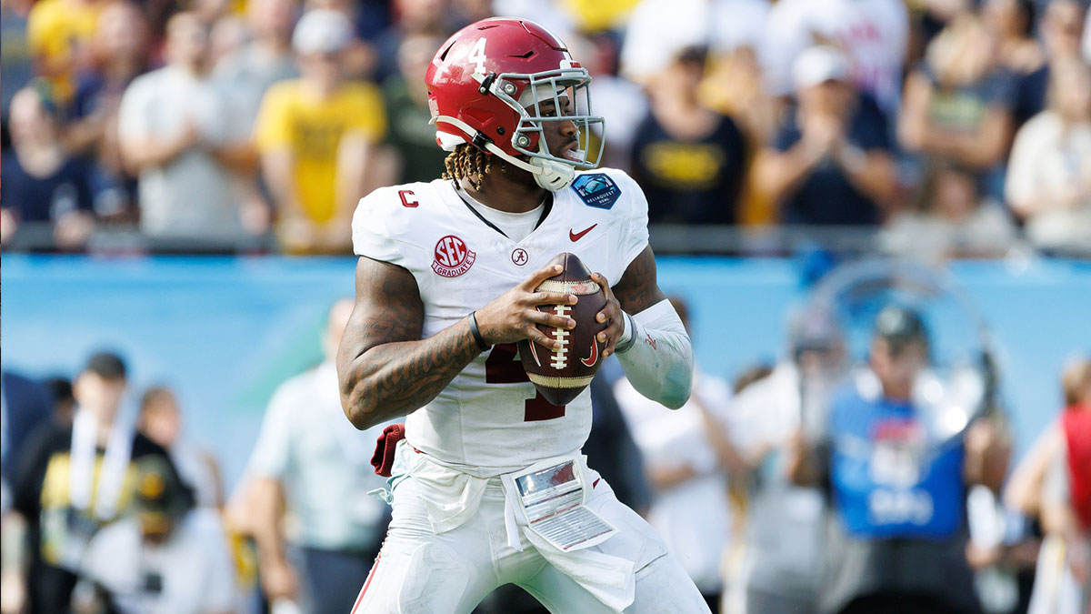 Alabama Crimson Tide quarterback Jalen Milroe (4) looks to throw against the Michigan Wolverines during the second half at Raymond James Stadium. Mandatory Credit: Matt Pendleton-Imagn Images