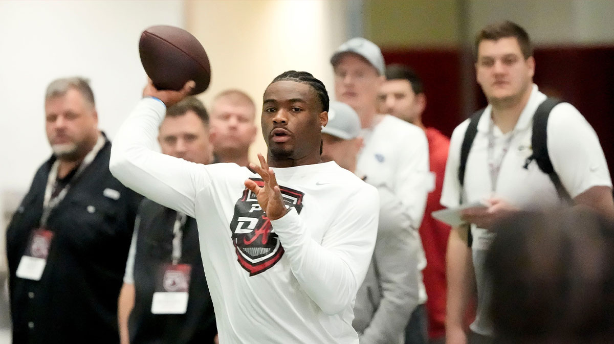Mar 19, 2025; Tuscaloosa AL, USA; Quarterback Jalen Milroe throws for scouts at the University of Alabama Pro Day as several Crimson Tide players worked out for NFL teams in the Hank Crisp Indoor Practice Facility.
