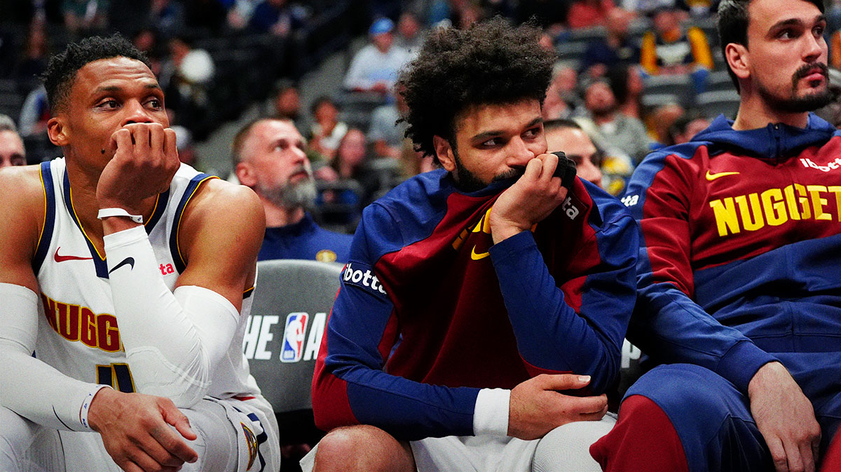 Denver Nuggets guard Russell Westbrook (4), guard Jamal Murray (27) and forward Dario Saric (9) on the bench in the fourth quarter against the Minnesota Timberwolves at Ball Arena.