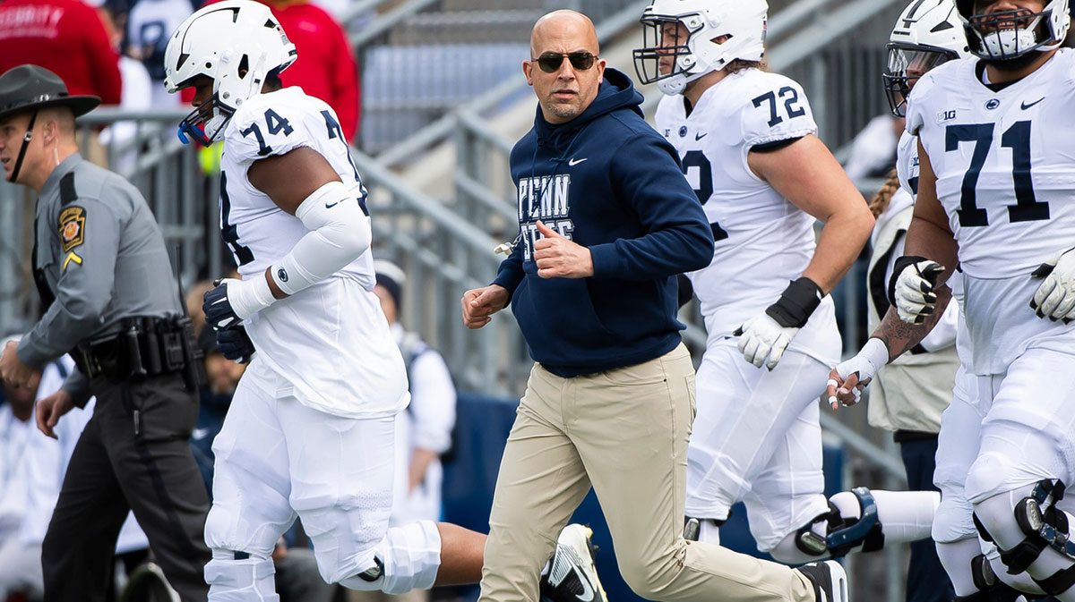 Penn State head coach James Franklin leads the team onto the field at the start of the Blue-White game at Beaver Stadium on Saturday, April 13, 2024, in State College. The White team defeated the Blue team, 27-0.