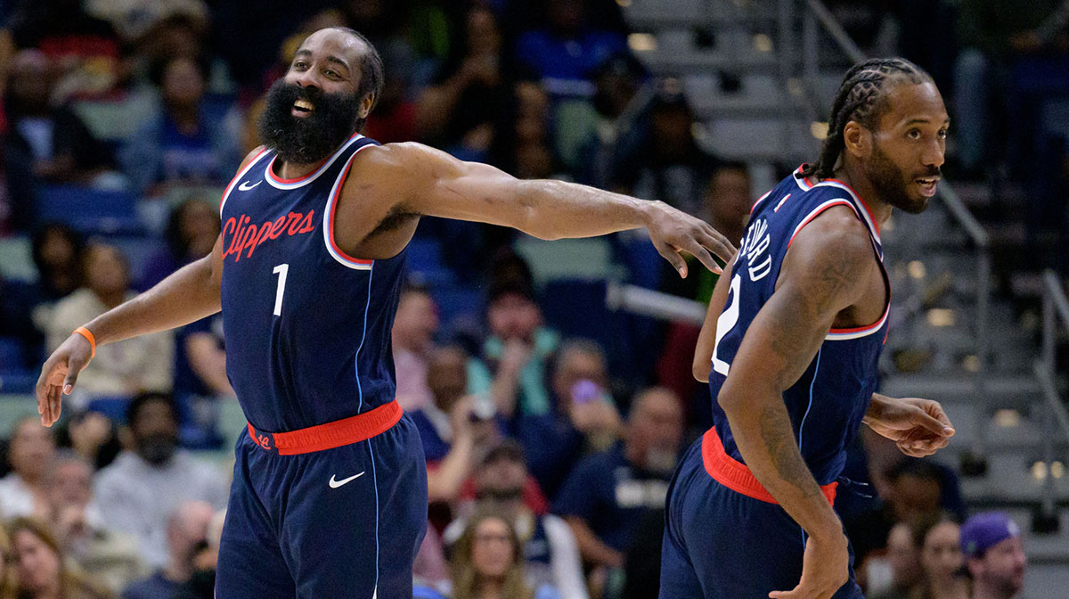 Los Angeles Clippers forward Kawhi Leonard (2) and Los Angeles Clippers guard James Harden (1) react during the second half against the New Orleans Pelicans at Smoothie King Center.