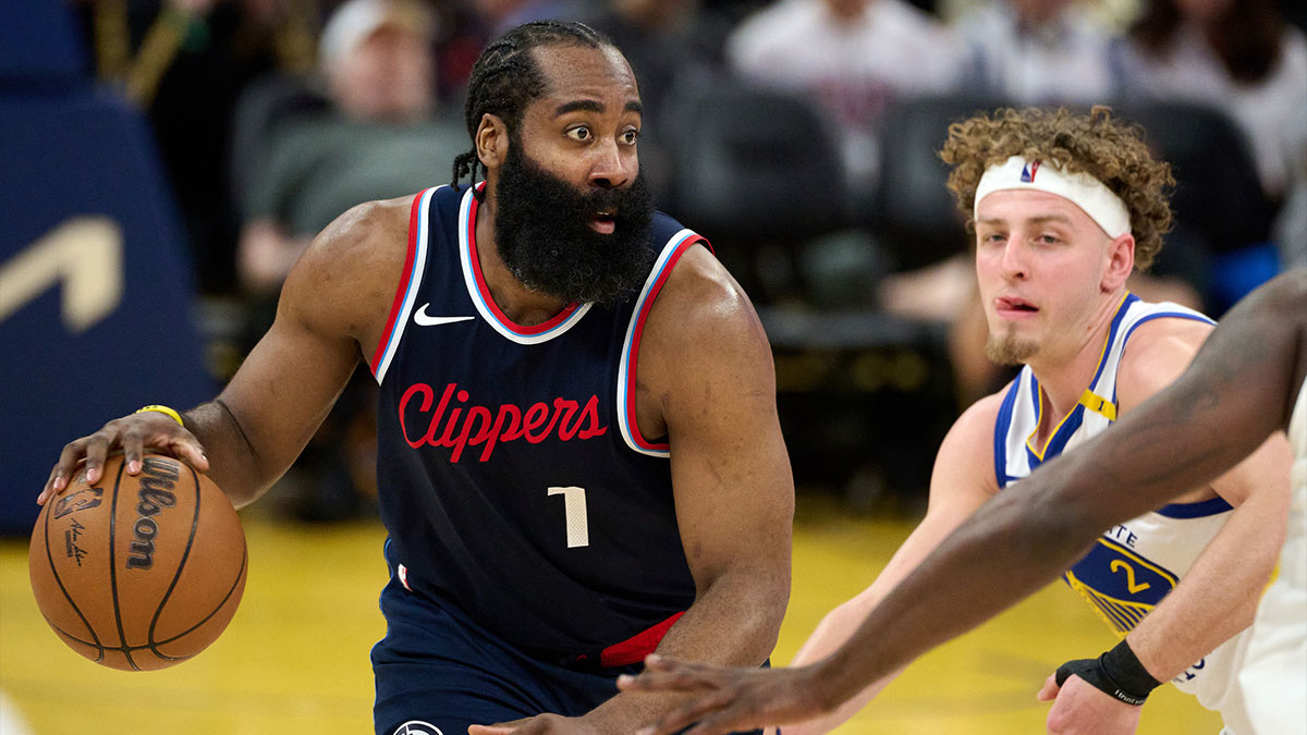 LA Clippers guard James Harden (1) controls the ball against Golden State Warriors guard Brandin Podziemski (2) during the third quarter at Chase Center.