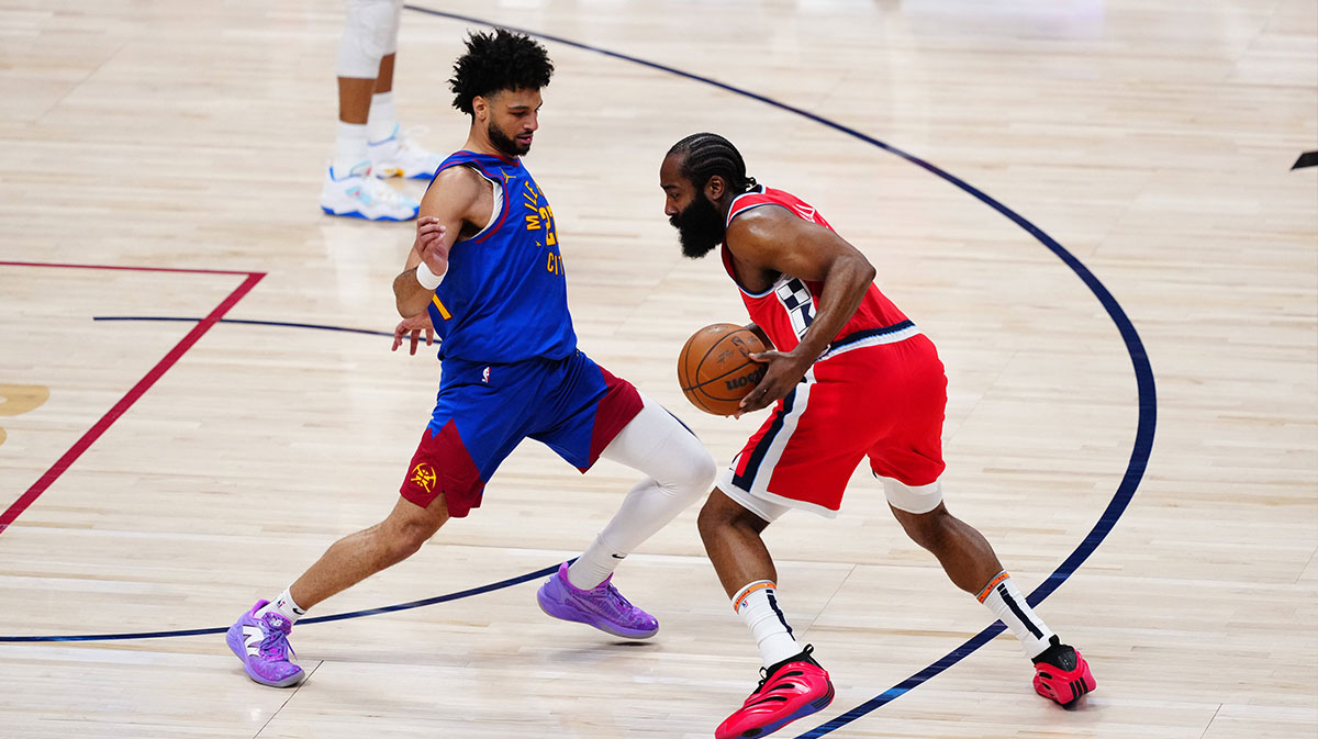 Denver Nuggets guard Jamal Murray (27) defends on LA Clippers guard James Harden (1) in the first quarter at Ball Arena.