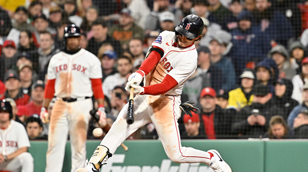 Boston Red Sox left fielder Jarren Duran (16) hits a double against the St. Louis Cardinals during the fifth inning at Fenway Park