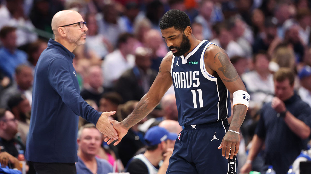 Dallas Mavericks head coach Jason Kidd high fives guard Kyrie Irving (11) during the third quarter against the Minnesota Timberwolves in game four of the western conference finals for the 2024 NBA playoffs at American Airlines Center.