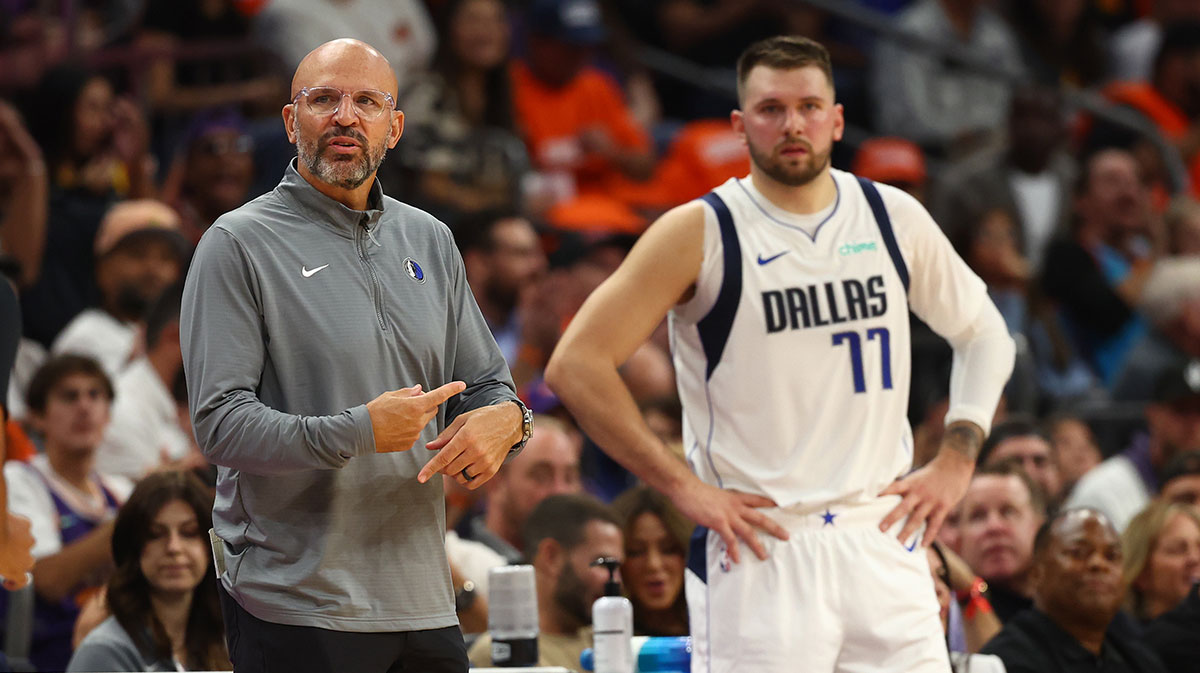 Dallas Mavericks head coach Jason Kidd with guard Luka Doncic (77) against the Phoenix Suns in the first half at Footprint Center.