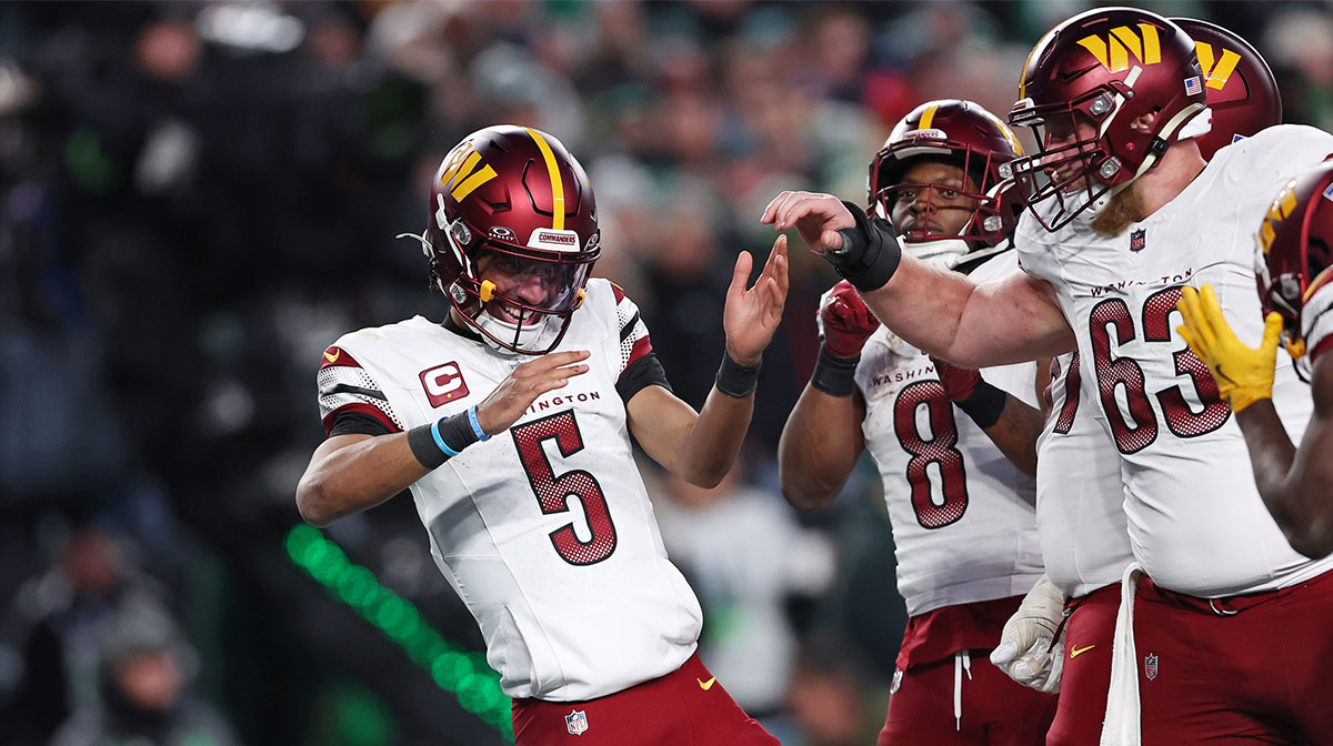 Washington Commanders quarterback Jayden Daniels (5) celebrates after a play against the Philadelphia Eagles during the second half in the NFC Championship game at Lincoln Financial Field.