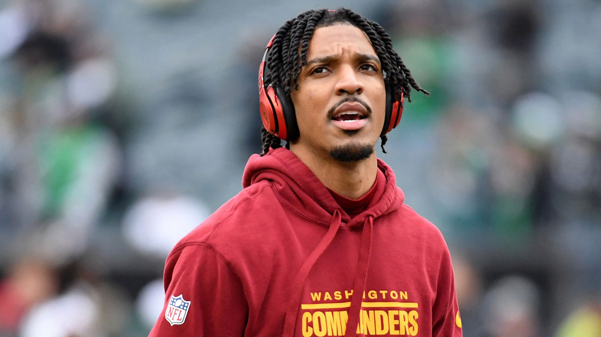 Washington Commanders quarterback Jayden Daniels (5) looks on before the NFC Championship game at Lincoln Financial Field