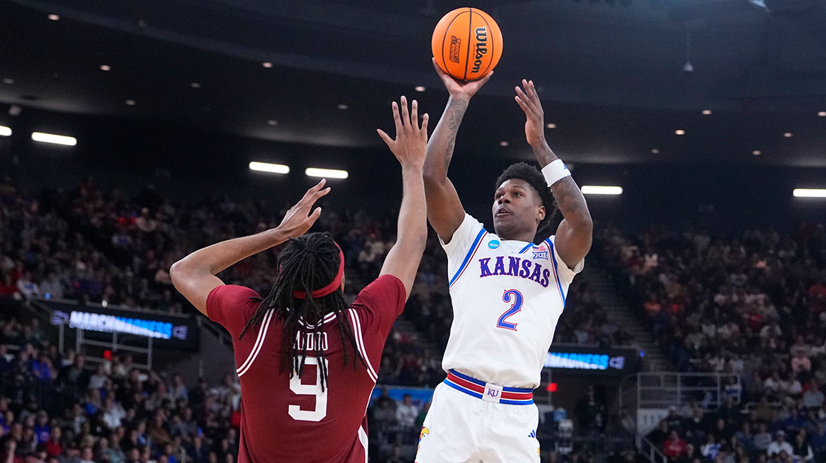 Kansas Jayhawks guard AJ Storr (2) shoots the ball against Arkansas Razorbacks forward Jonas Aidoo (9) during the second half at Amica Mutual Pavilion.