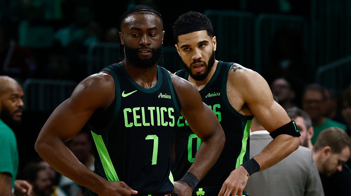 Boston Celtics guard Jaylen Brown (7) and forward Jayson Tatum (0) stand on the court during a timeout during the second half of their loss to the Cleveland Cavaliers at TD Garden.