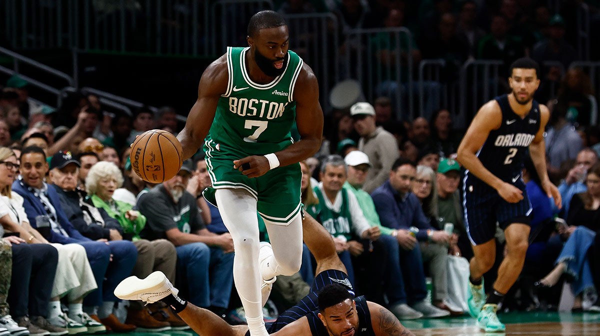 Orlando Magic guard Cory Joseph (10) hits the floor after Boston Celtics guard Jaylen Brown (7) stole the ball from him during the second half of game two of the first round of the 2024 NBA Playoffs at TD Garden.