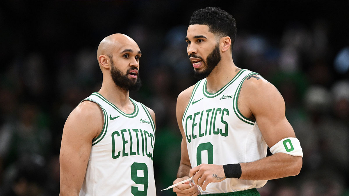 Boston Celtics guard Derrick White (9) and forward Jayson Tatum (0) talk before a game against the San Antonio Spurs at the TD Garden. Mandatory Credit: Brian Fluharty-Imagn Images