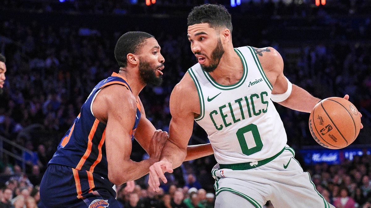 Boston Celtics forward Jayson Tatum (0) drives to the basket while being defended by New York Knicks forward Mikal Bridges (25) during the second half at Madison Square Garden.