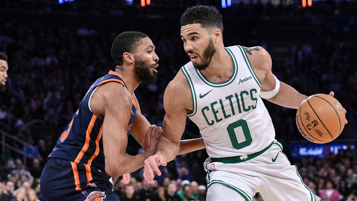 Boston Celtics forward Jayson Tatum (0) drives to the basket while being defended by New York Knicks forward Mikal Bridges (25) during the second half at Madison Square Garden.