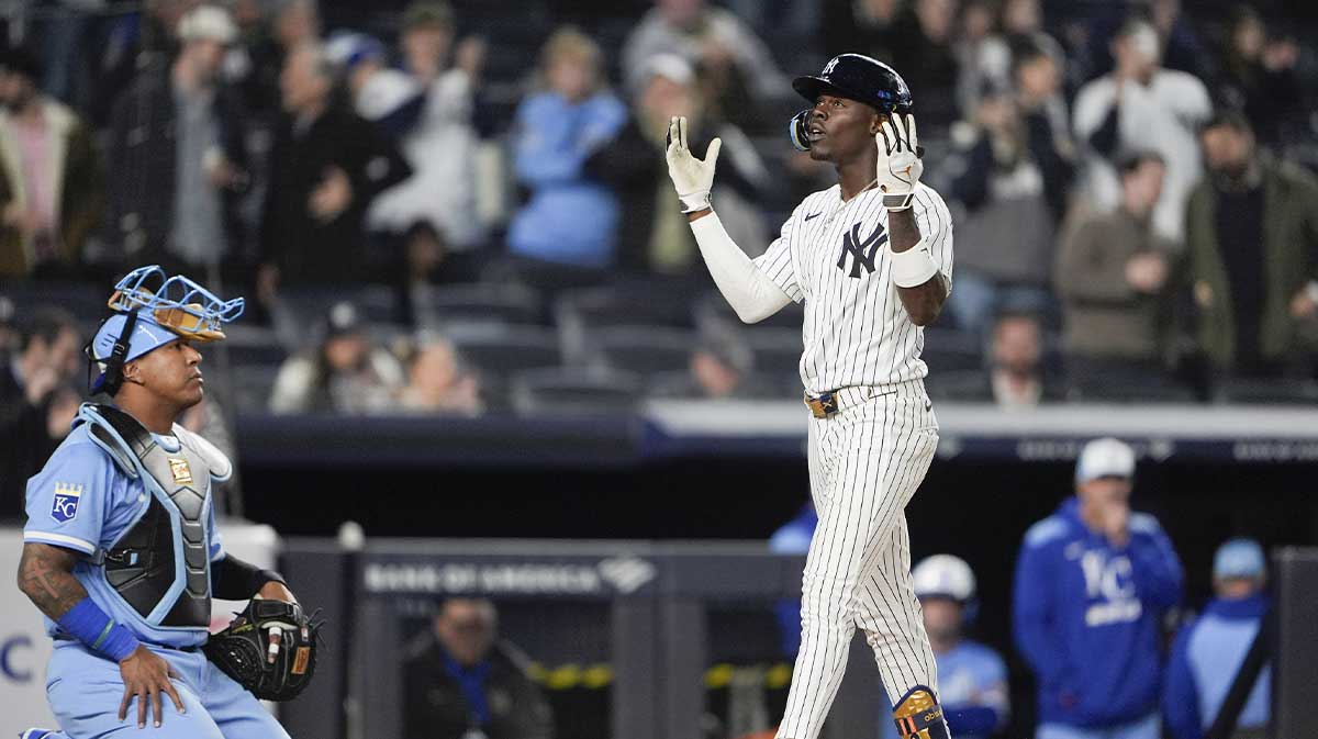 New York Yankees second baseman Jazz Chisholm Jr. (13) reacts to hitting a home run against the Kansas City Royals during the fourth inning at Yankee Stadium.