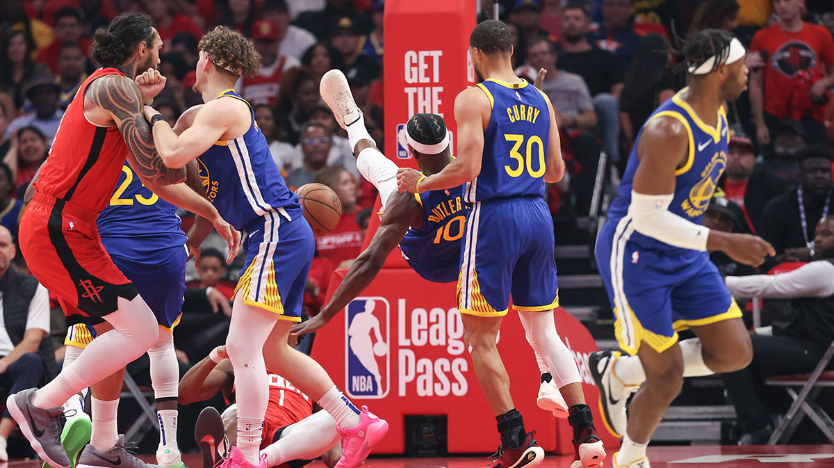 Golden State Warriors forward Jimmy Butler III (10) falls to the floor and suffers an apparent injury during the first quarter during game two of the first round for the 2024 NBA Playoffs against the Houston Rockets at Toyota Center.