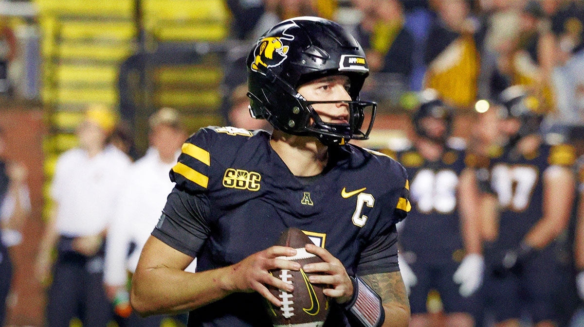 Appalachian State Mountaineers quarterback Joey Aguilar (4) drops to throw a pass during the second half against the South Alabama Jaguars at Kidd Brewer Stadium.