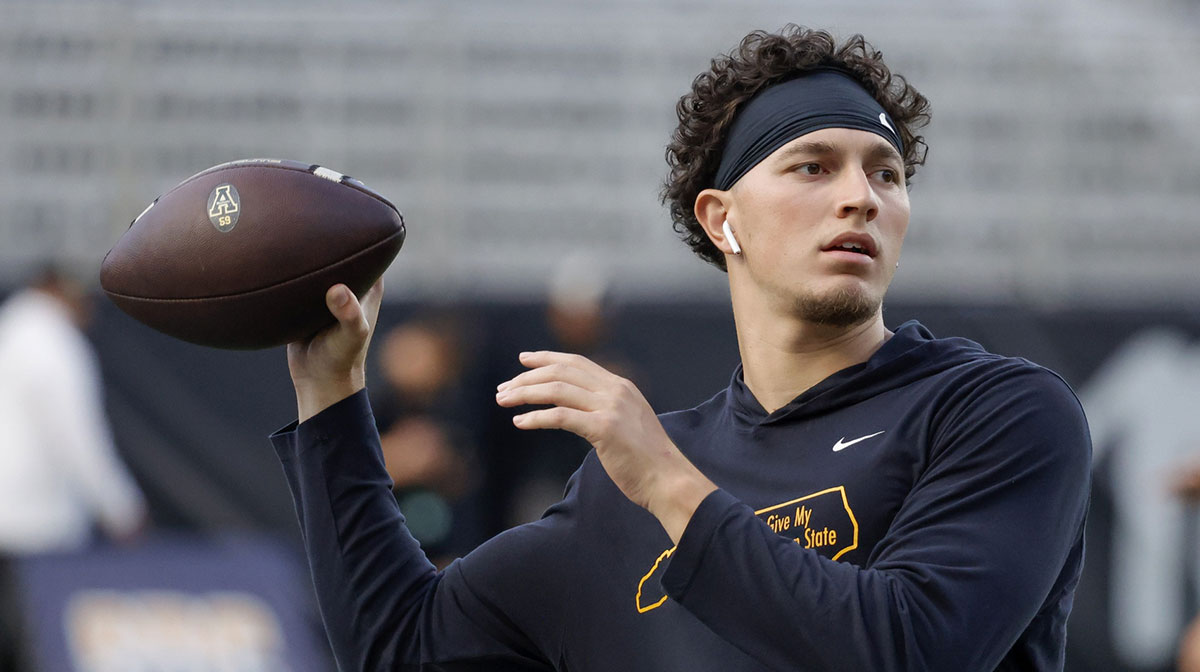 Appalachian State Mountaineers quarterback Joey Aguilar (4) throws a warmup pass before the game against the South Alabama Jaguars at Kidd Brewer Stadium.