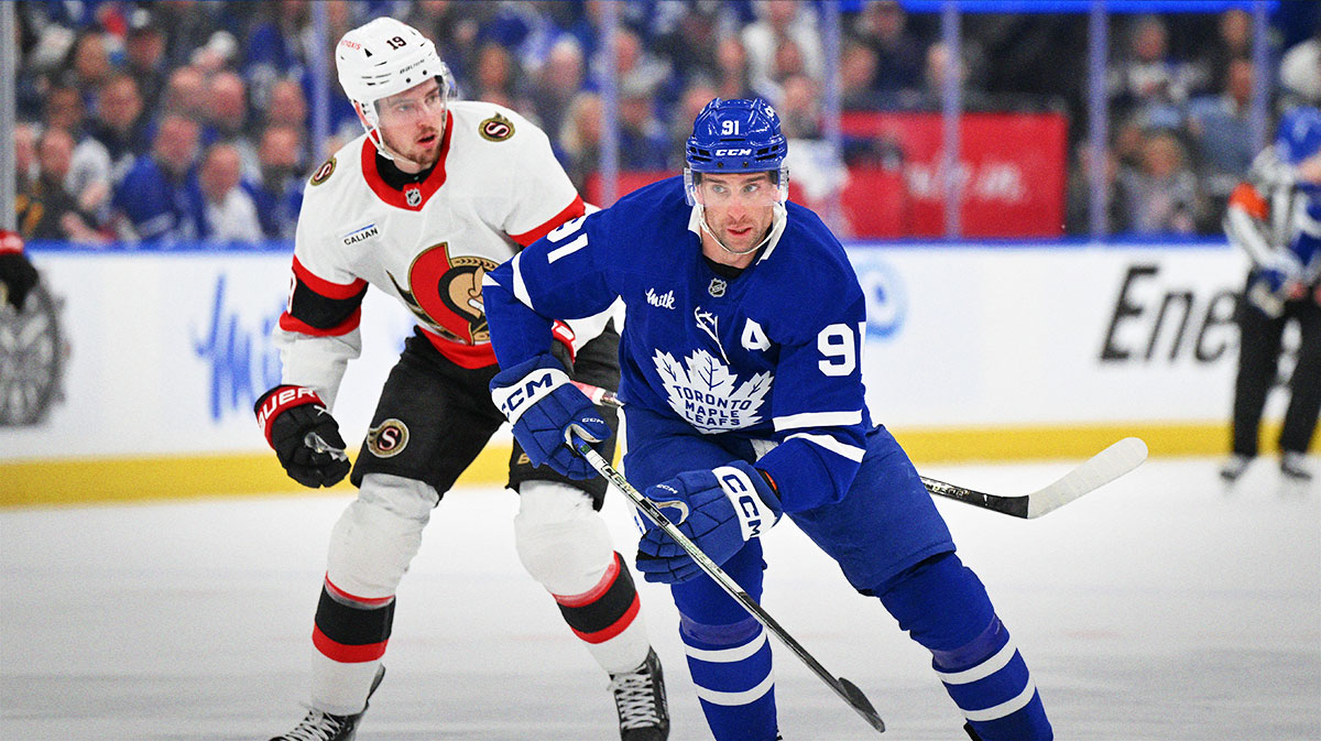 Toronto Maple Leafs forward John Tavares (91) skates ahead of Ottawa Senators forward Drake Batherson (19) in the first period in game two of the first round of the 2025 Stanley Cup Playoffs at Scotiabank Arena.