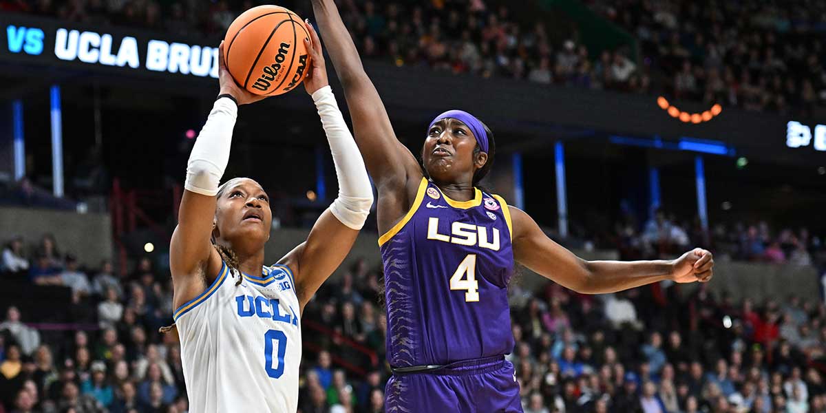UCLA Bruins forward Janiah Barker (0) shoots against LSU Lady Tigers guard Flau'Jae Johnson (4) during the first half of a Elite 8 NCAA Tournament basketball game at Spokane Arena. Mandatory Credit: James Snook-Imagn Images