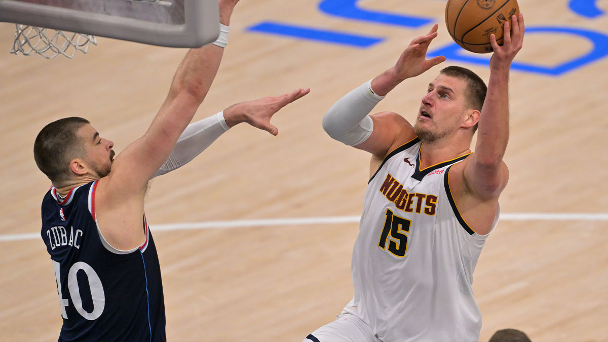 Los Angeles Clippers center Ivica Zubac (40) defends Denver Nuggets center Nikola Jokic (15) in the second half of game four of round one of the 2024 NBA Playoffs at Intuit Dome.