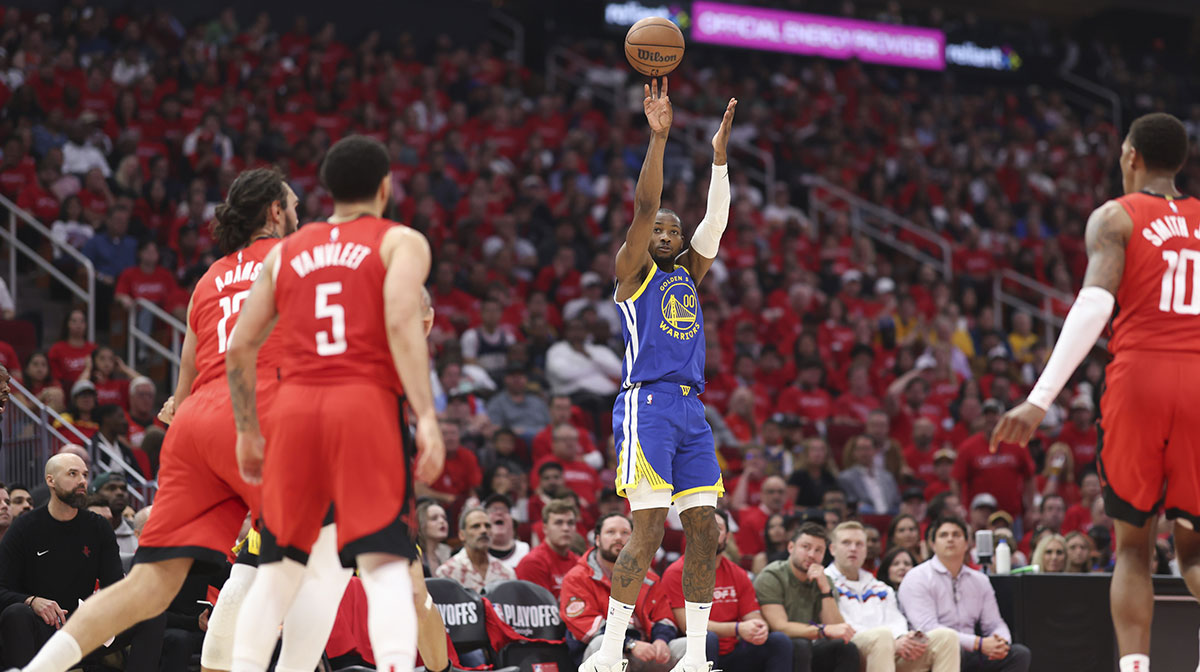 Golden State Warriors forward Jonathan Kuminga (00) shoots the ball during the second quarter during game two of the first round for the 2024 NBA Playoffs against the Houston Rockets at Toyota Center.