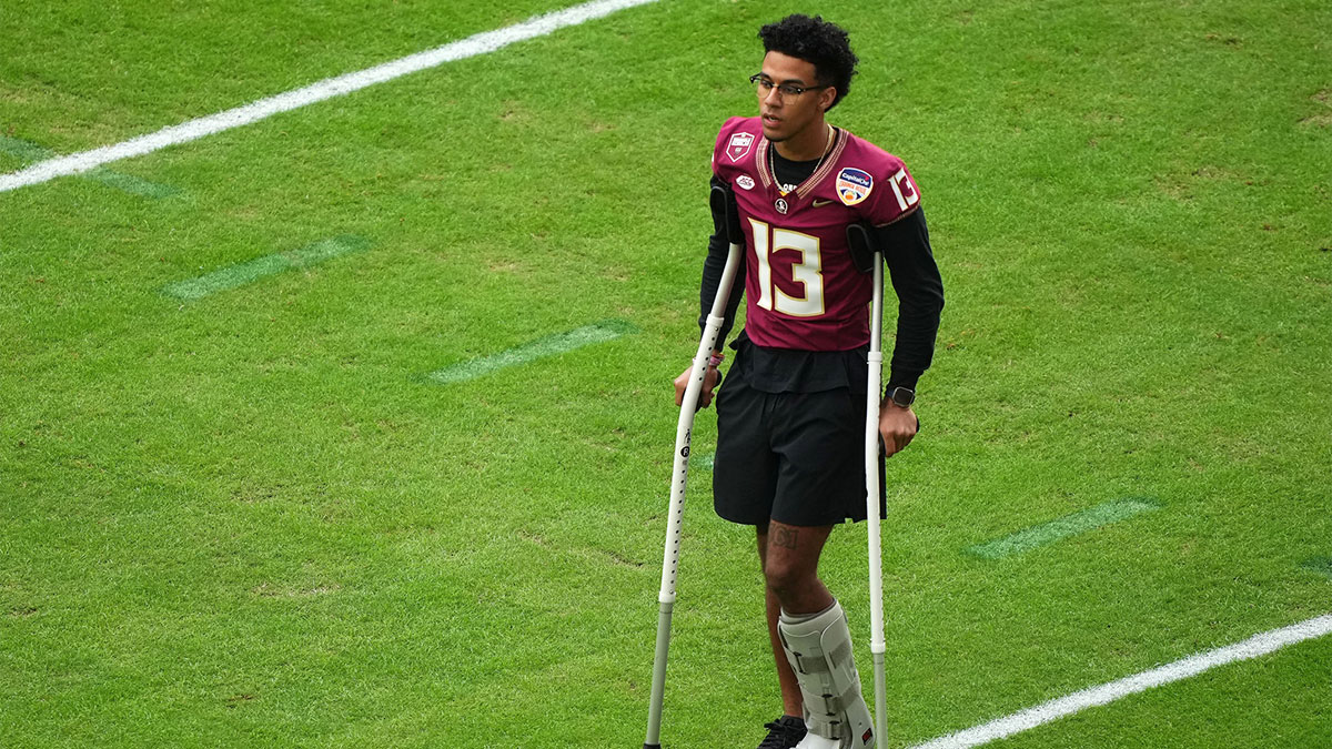 Florida State Seminoles quarterback Jordan Travis (13) before the 2023 Orange Bowl against the Georgia Bulldogs at Hard Rock Stadium. Jets