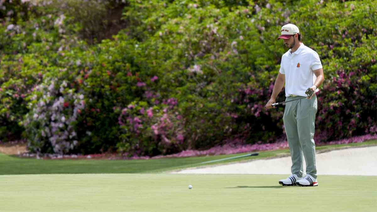 Jose Luis Ballester looks to putt on the no. 13 green during the first round of the Masters Tournament.
