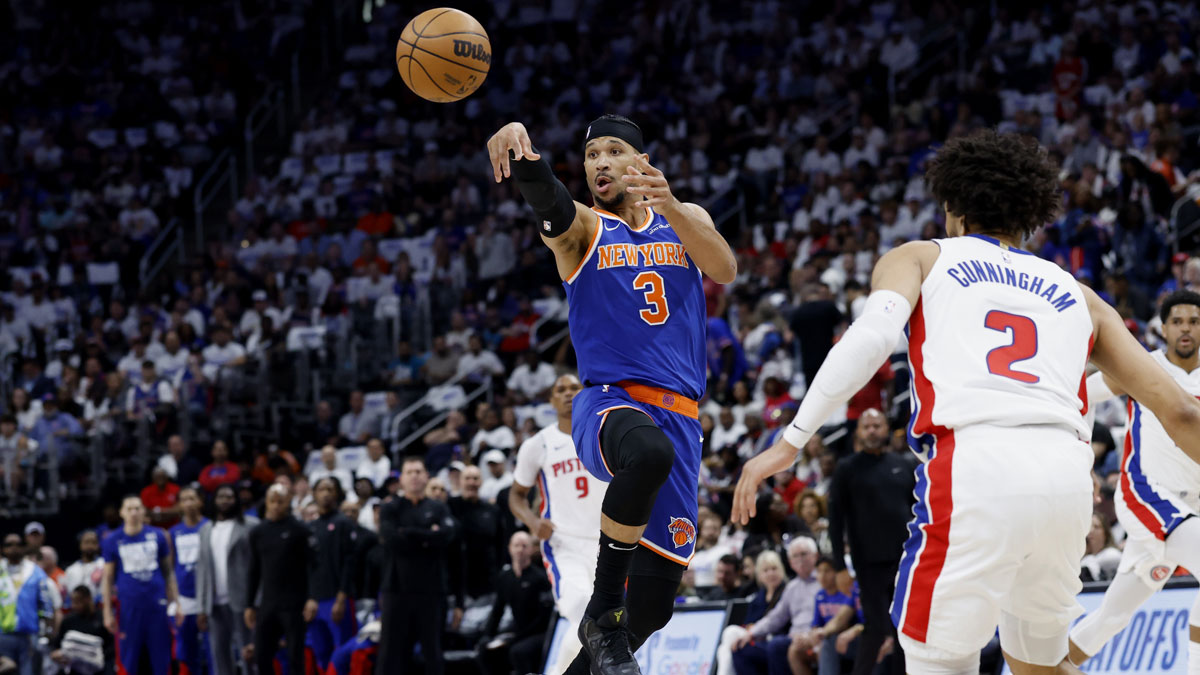 New York Knicks guard Josh Hart (3) passes on Detroit Pistons guard Cade Cunningham (2) in the first half during game three of first round for the 2024 NBA Playoffs at Little Caesars Arena