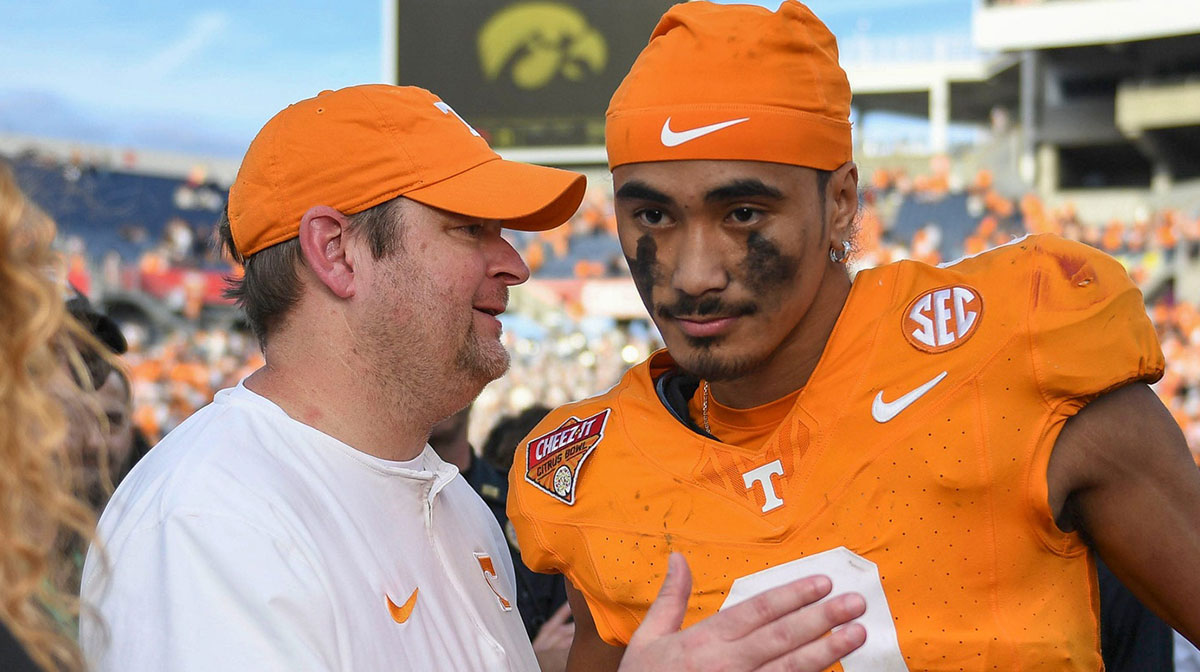 Tennessee head coach Josh Heupel turns to quarterback Nico Iamaleava (8) after their post game interview after winning the Citrus Bowl NCAA College football game on Monday, January 1, 2024 in Orlando, Fla. against Iowa.