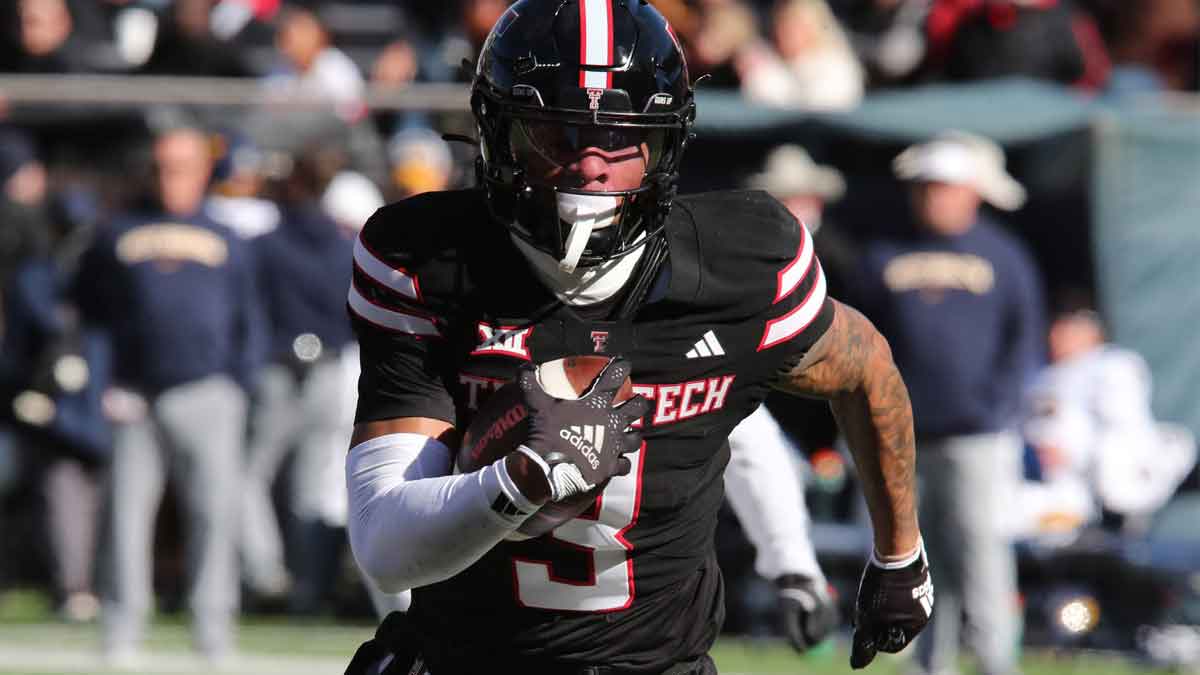 Texas Tech Red Raiders tight end Josh Kelly (3) rushes against the West Virginia Mountaineers in the first half at Jones AT&T Stadium and Cody Campbell Field. Mandatory Credit: Michael C. Johnson-Imagn Images