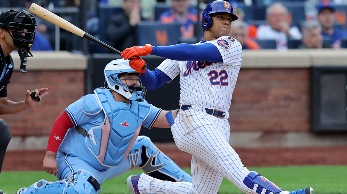 New York Mets right fielder Juan Soto (22) follows through on an RBI double against the Toronto Blue Jays during the sixth inning at Citi Field.
