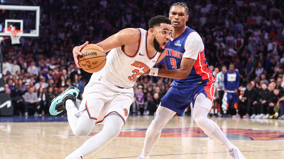 New York Knicks center Karl-Anthony Towns (32) drives past Detroit Pistons forward Ausar Thompson (9) in Game One of the First Round of the NBA Playoffs at Madison Square Garden.