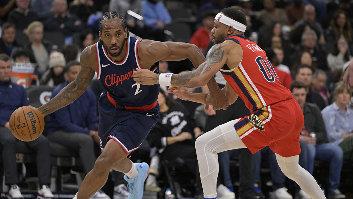 Los Angeles Clippers forward Kawhi Leonard (2) is defended by New Orleans Pelicans forward Bruce Brown (00) in the second half at Intuit Dome.