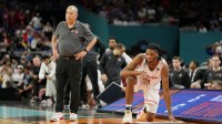 Houston Cougars head coach Kelvin Sampson and forward Joseph Tugler (11) look on against the Florida Gators during the second half of the national championship game of the Final Four of the 2025 NCAA Tournament at the Alamodome.