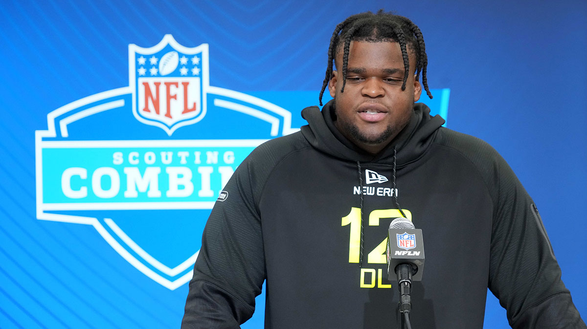 Michigan defensive lineman Kenneth Grant (DL12) during the 2025 NFL Scouting Combine at the Indiana Convention Center.