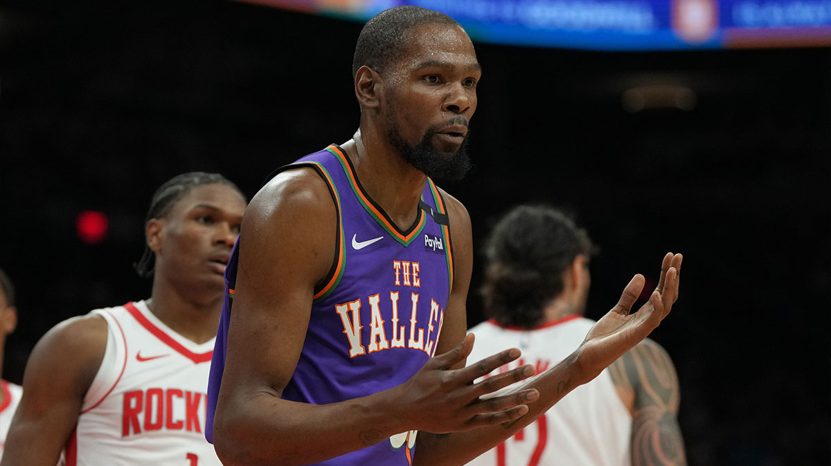 Phoenix Suns forward Kevin Durant (35) reacts after fouling a Houston Rockets player in the first half at Footprint Center.