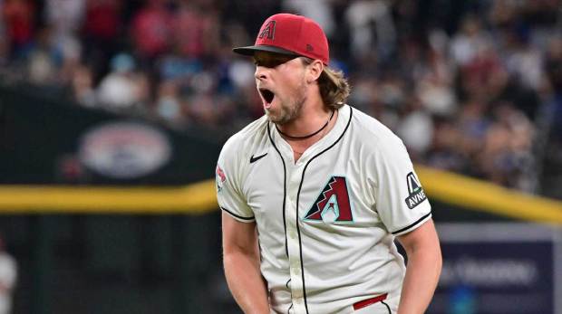 Arizona Diamondbacks pitcher Kevin Ginkel (37) celebrates after beating the San Francisco Giants at Chase Field.