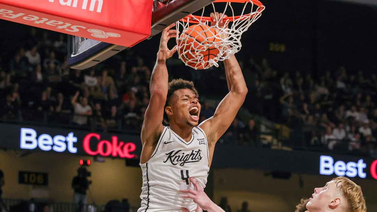 UCF Knights guard Keyshawn Hall (4) dunks during the second half against the Florida Atlantic Owls at Addition Financial Arena.