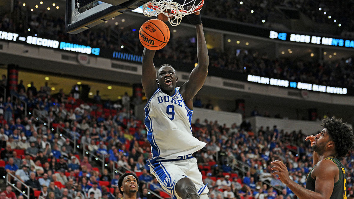 Duke Blue Devils Center Khaman Maluach (9) Dunks The Ball in the second half against the Baylor Bears in the second round of the NCAA tournament at the Lenovo Center.