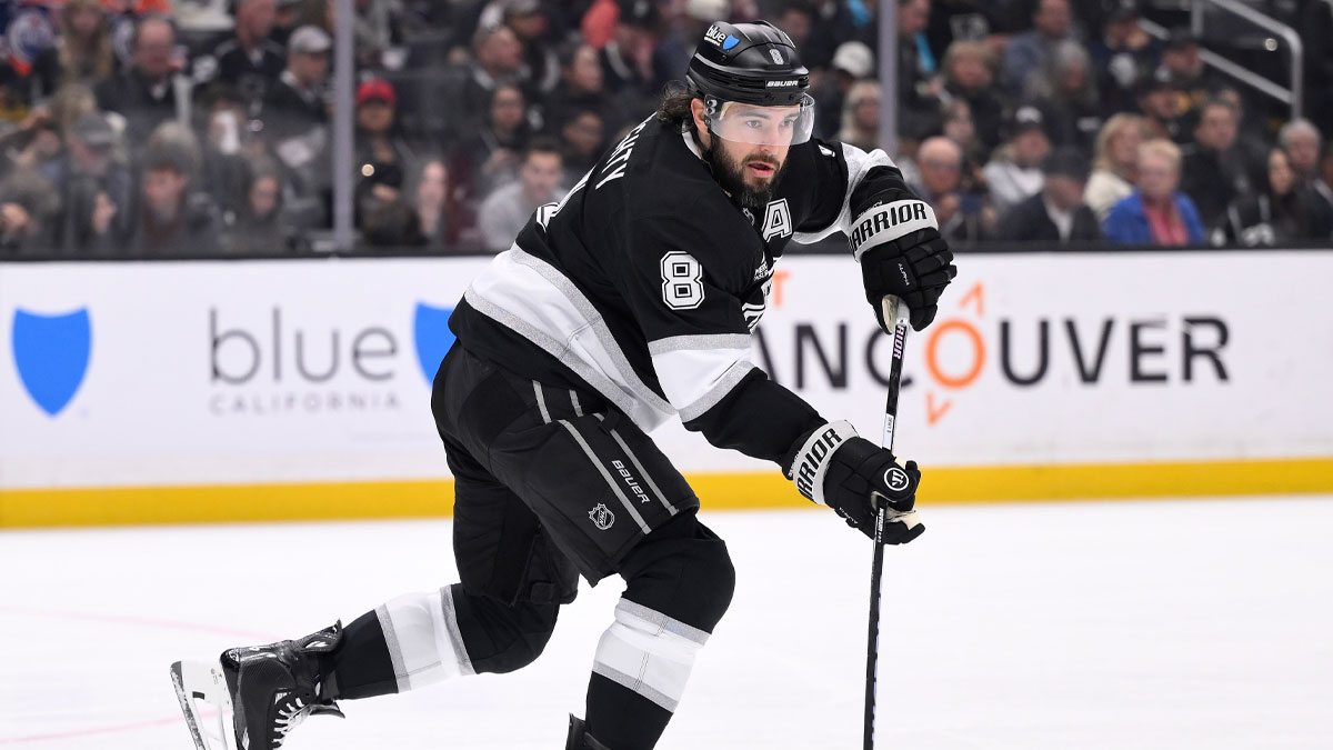 Los Angeles Kings defenseman Drew Doughty (8) moves the puck during an NHL game against the Edmonton Oilers at Crypto.com Arena.