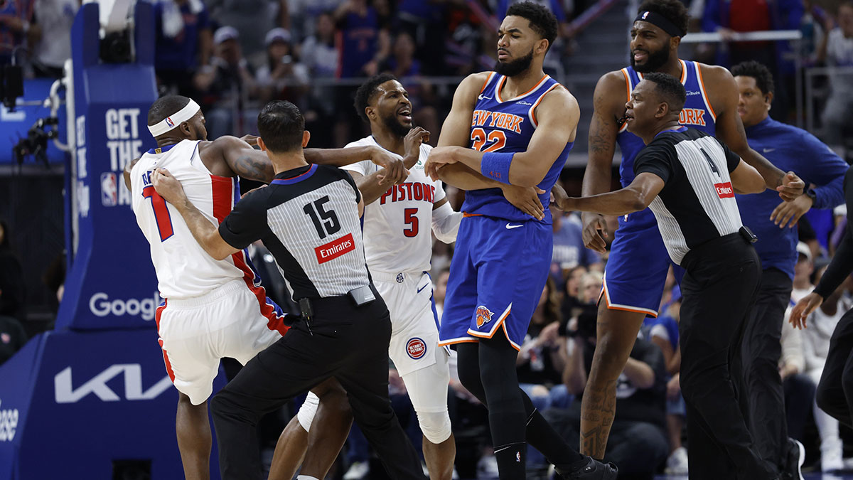Referee Zach Zarba (15) gets between Detroit Pistons forward Paul Reed (7) and New York Knicks center Karl-Anthony Towns (32) in the first half during game three of first round for the 2024 NBA Playoffs at Little Caesars Arena.
